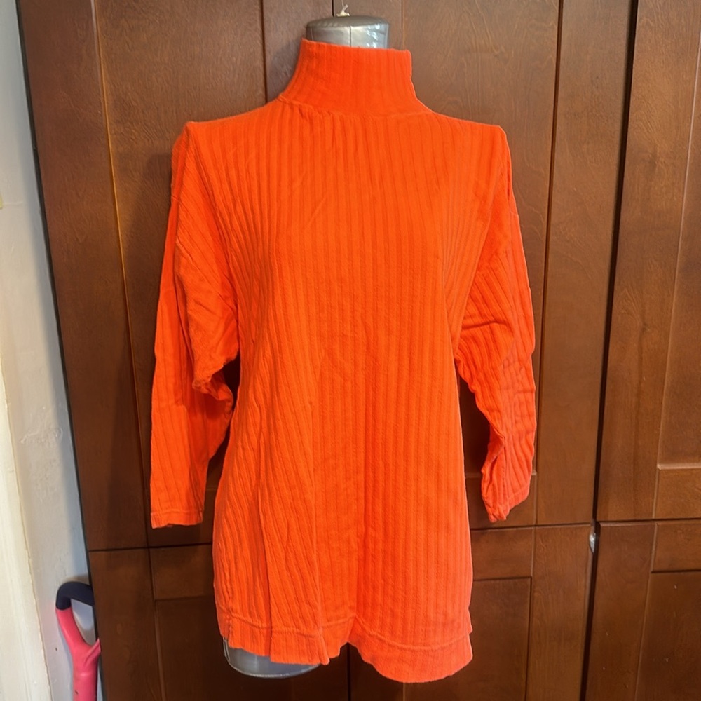 Bright orange stretchy butt covering pullover